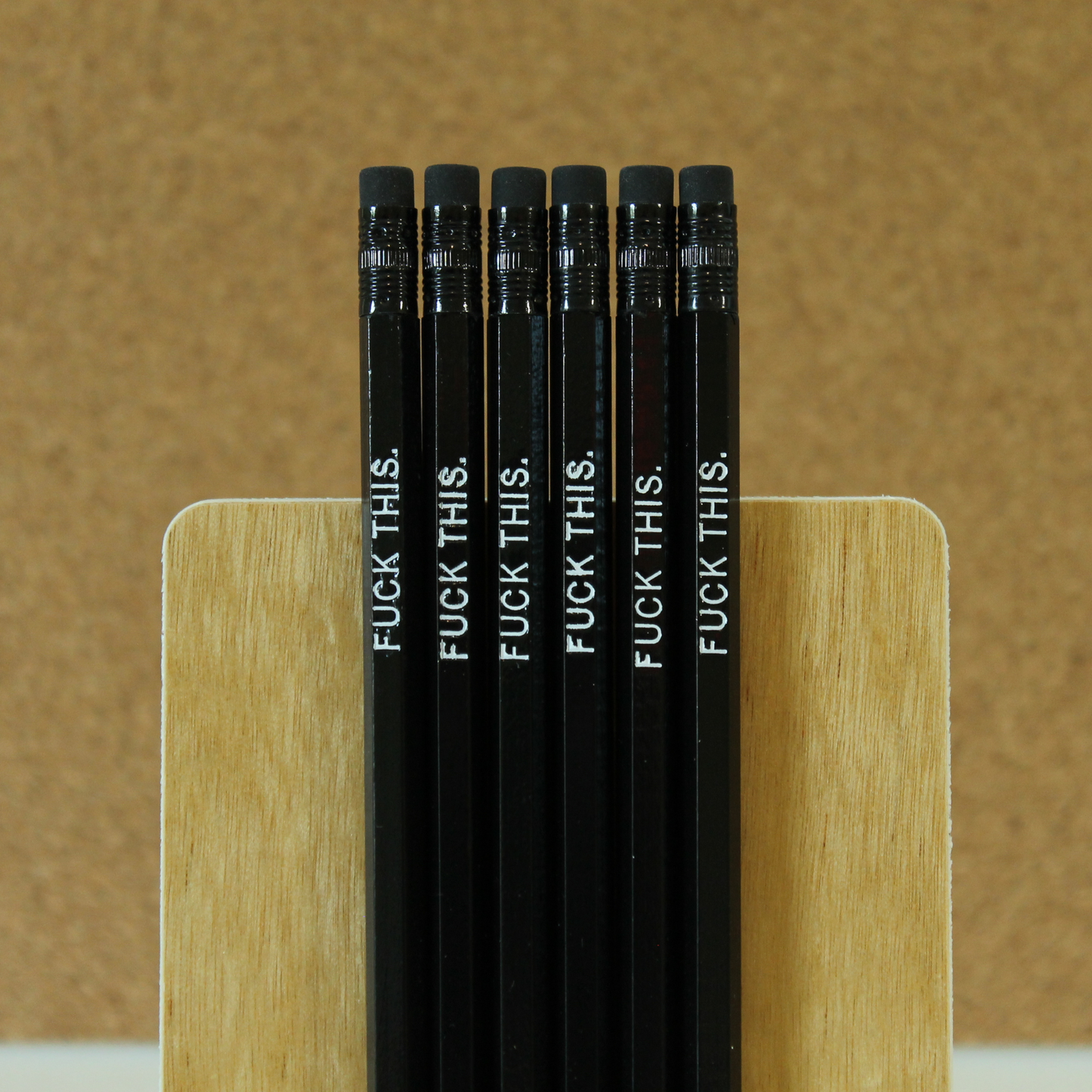 Motivational pencil: "Fuck this."