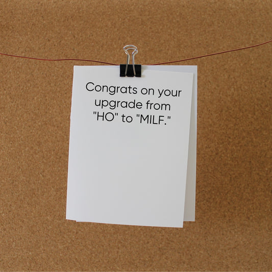 Funny Baby Card: "Congrats on your upgrade from 'HO' to 'MILF."
